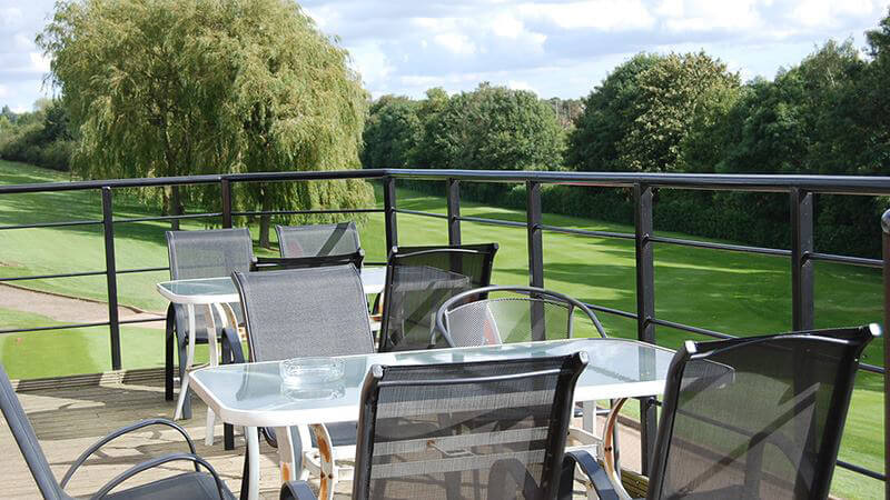 A sunny balcony overlooking the 18th green